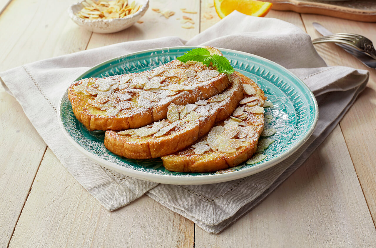 Crunchy almond & orange french toast with sugar topping